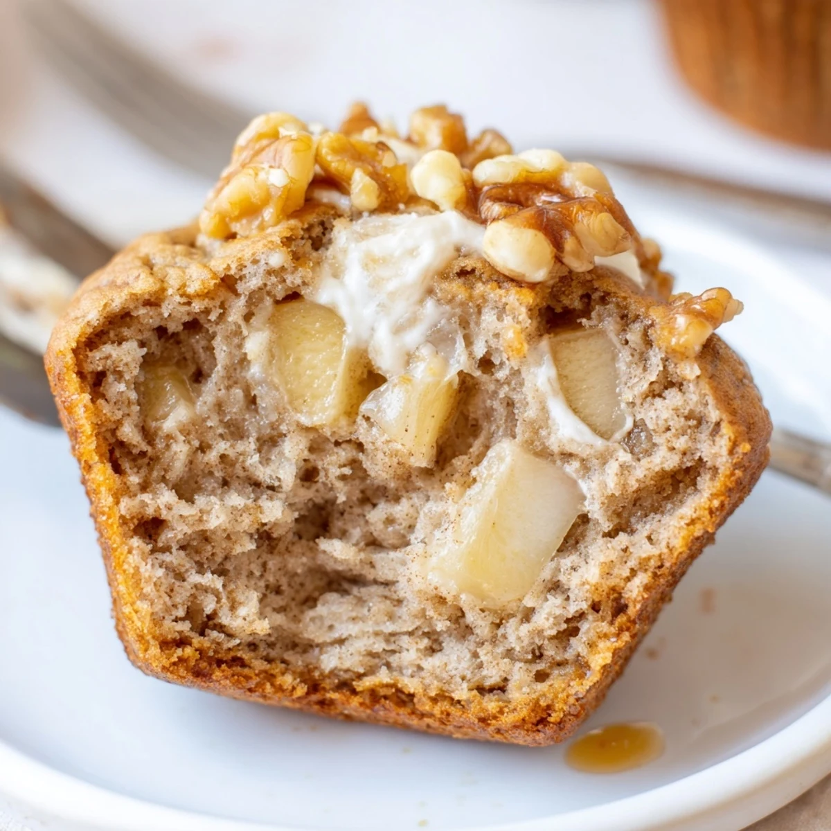 Healthy Apple Cinnamon Greek Yogurt Muffins with golden tops and warm cinnamon aroma