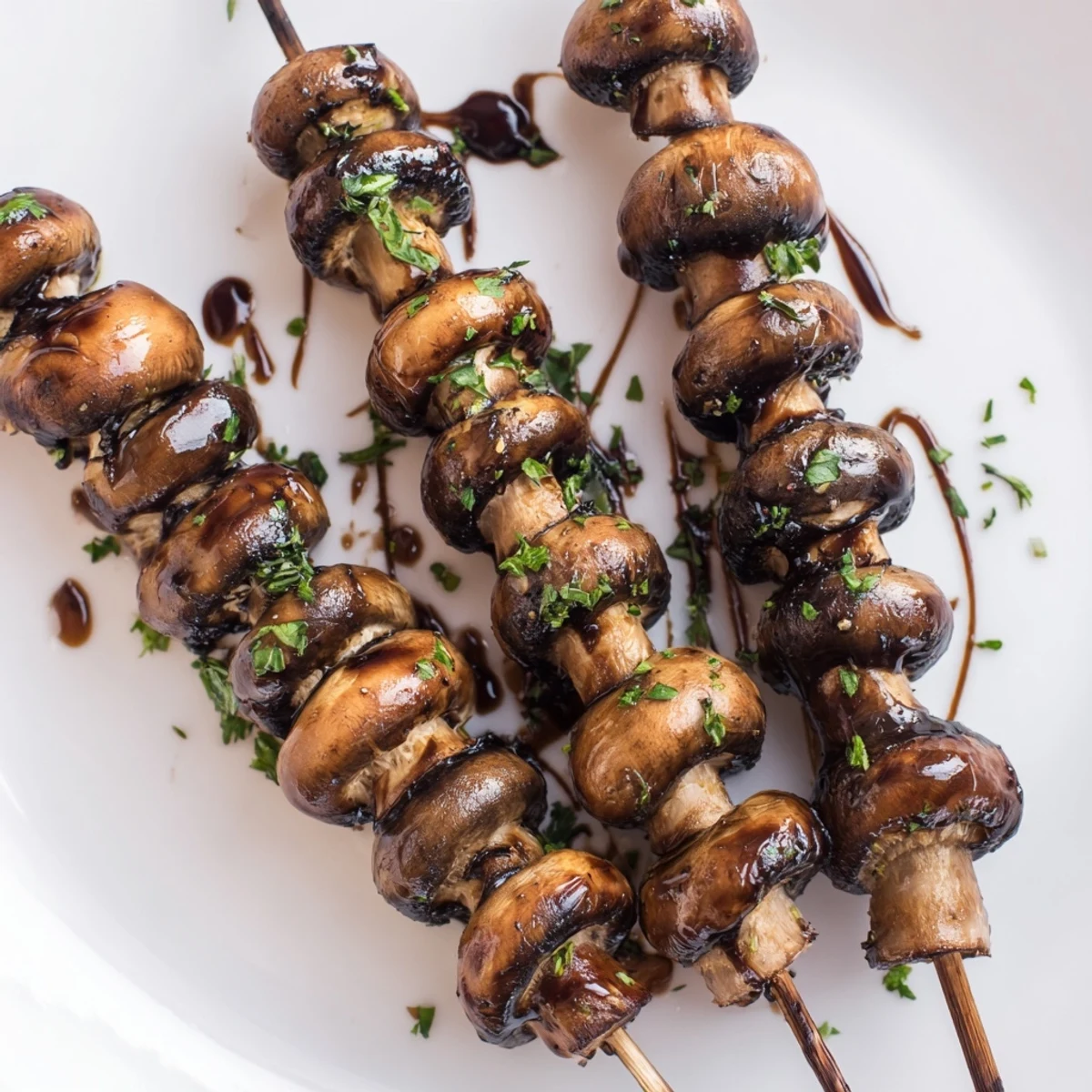 Balsamic Garlic Grilled Mushroom Skewers glistening with glaze, charred edges, parsley sprinkle