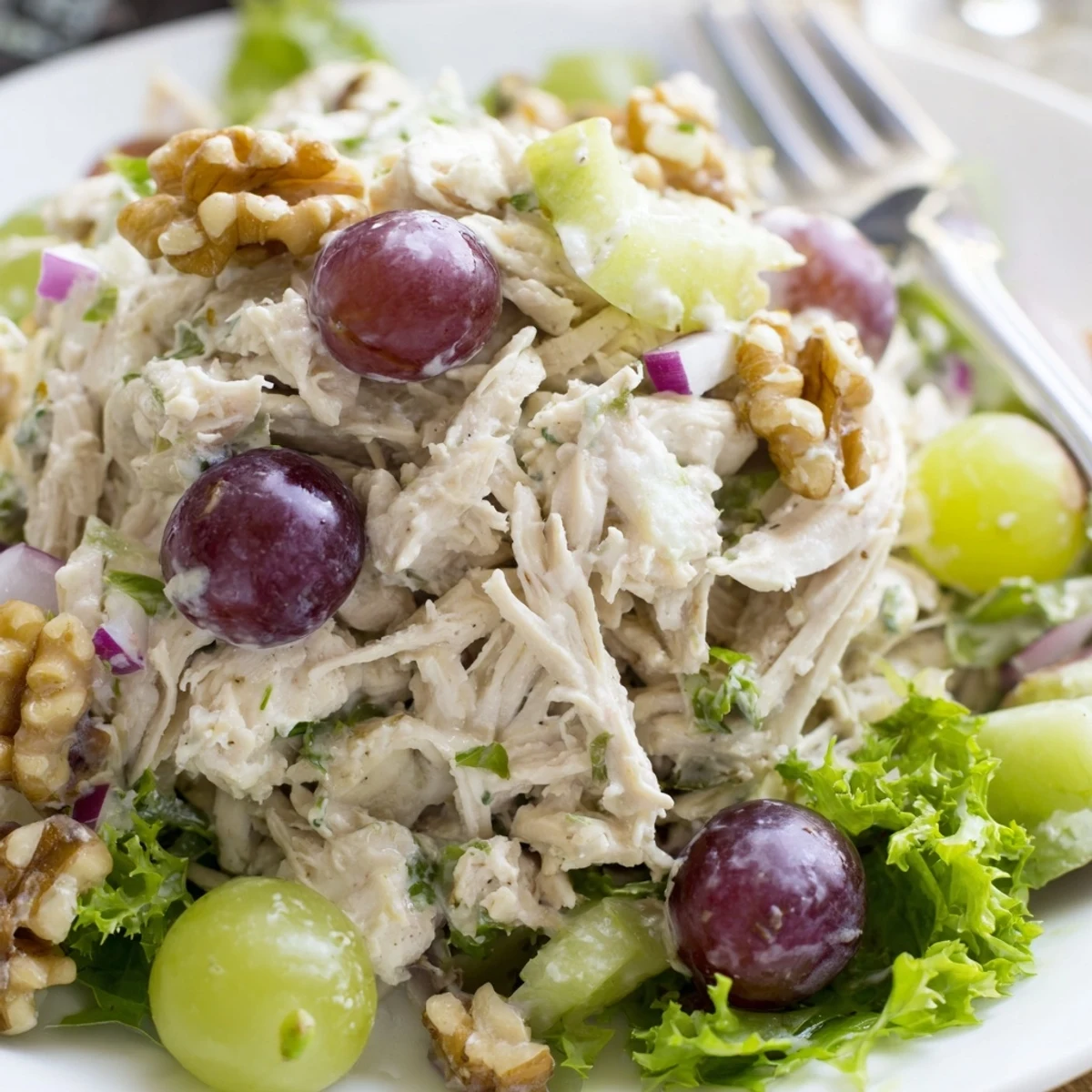Chicken Salad With Creamy Yogurt Dressing Recipe shows tender chicken, crunchy nuts, tangy dressing