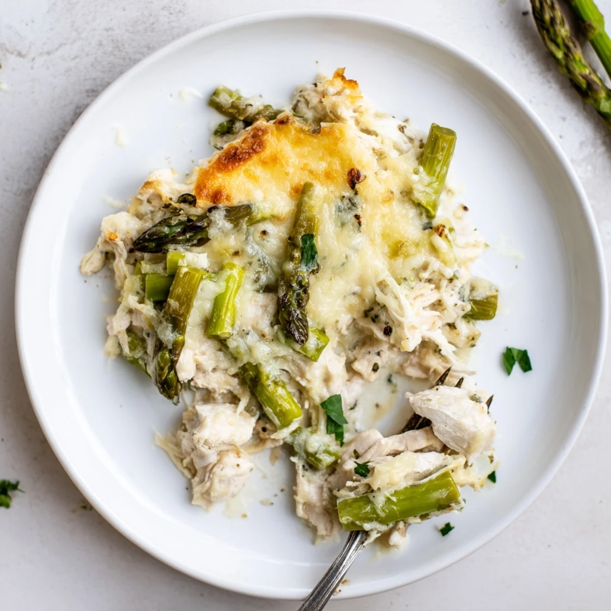 Creamy Chicken Asparagus Bake bubbling golden, tender chicken, crisp asparagus, creamy cheese