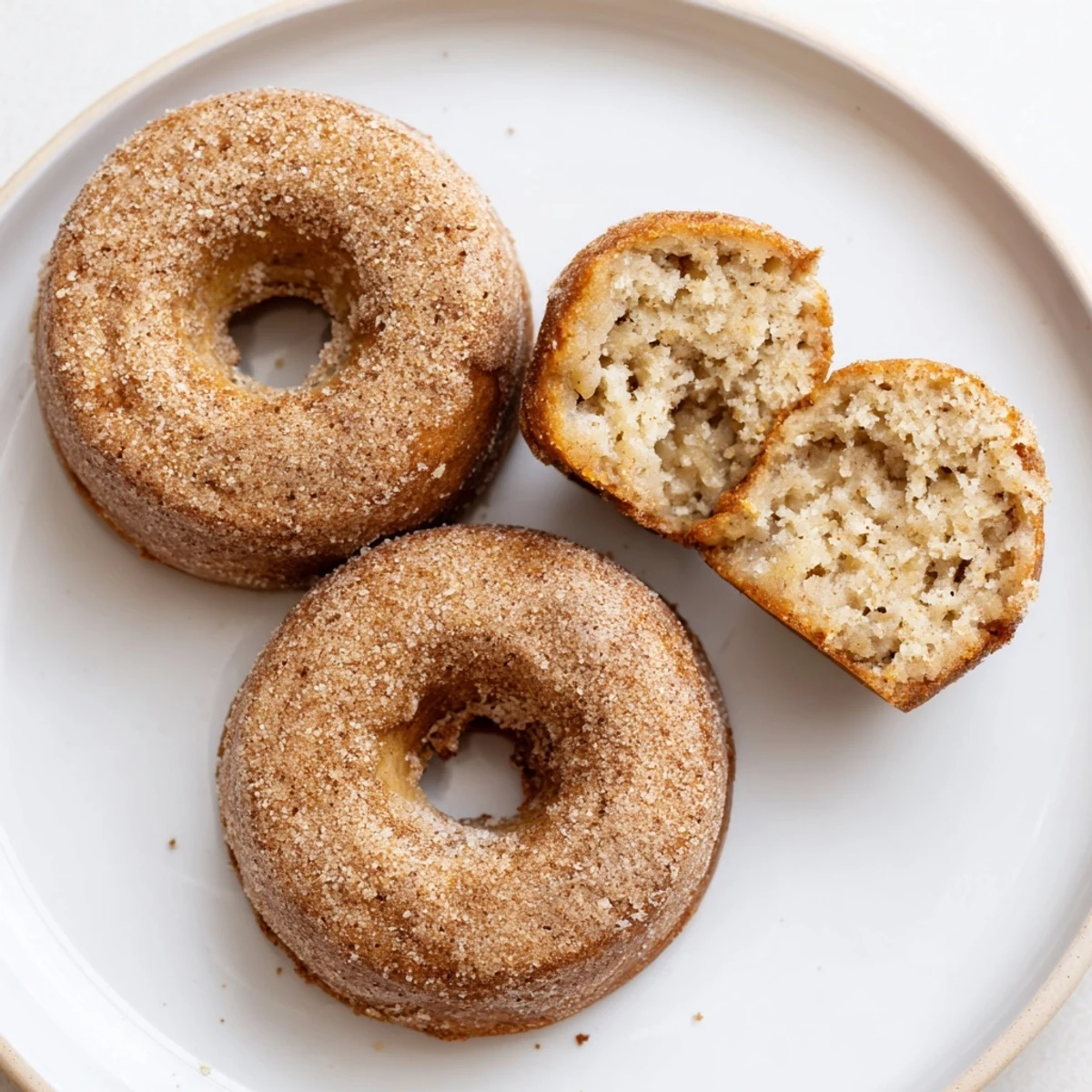 Warm Banana Donuts cooling on wire rack, soft crumb and cinnamon dusting