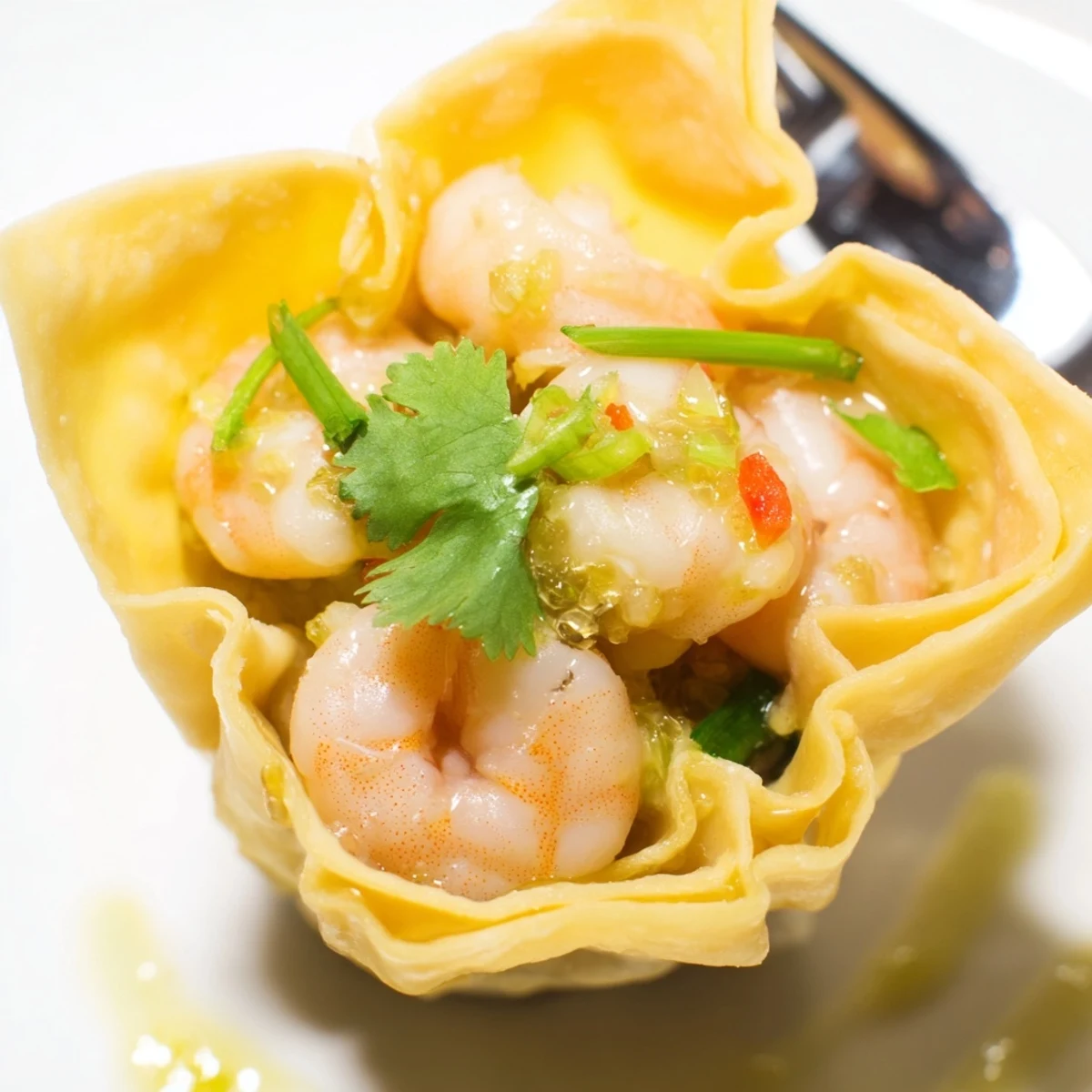 Crispy Shrimp Wonton Cups With Lime Cream served warm on a party platter