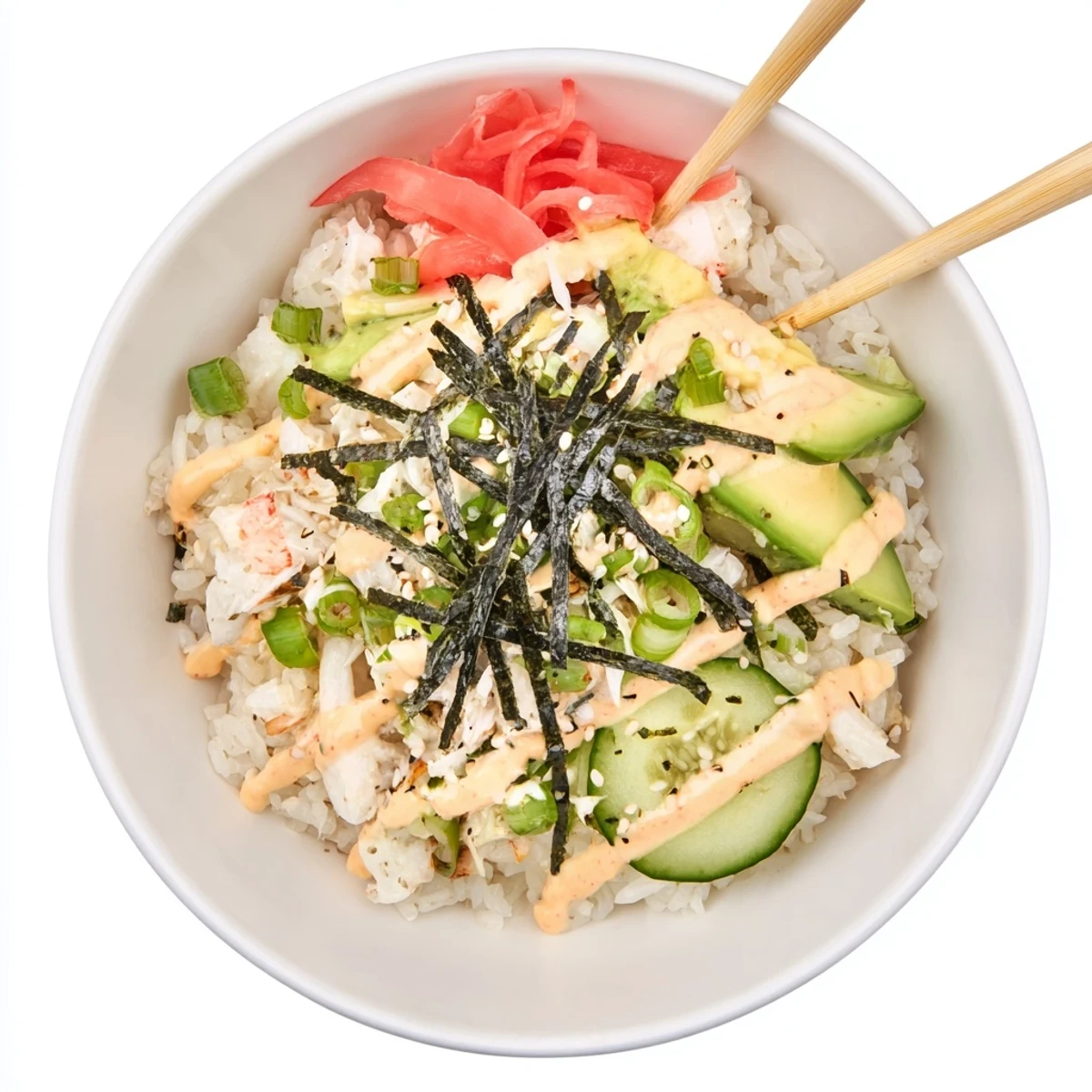 Deconstructed California Roll Sushi Bowl with imitation crab fresh avocado diced cucumber and spicy mayo drizzle