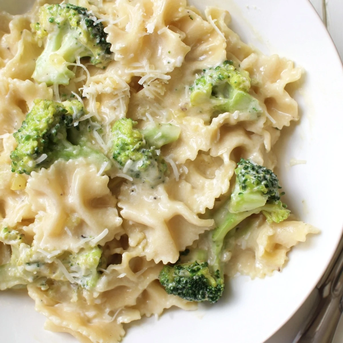 Creamy mafaldine pasta limone with broccoli in a bright lemon Parmesan sauce