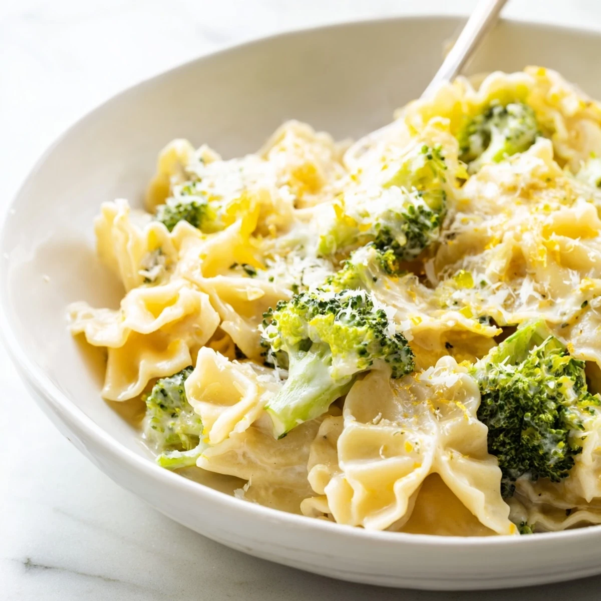 Mafaldine pasta limone broccoli tossed in silky citrus cream with tender green florets