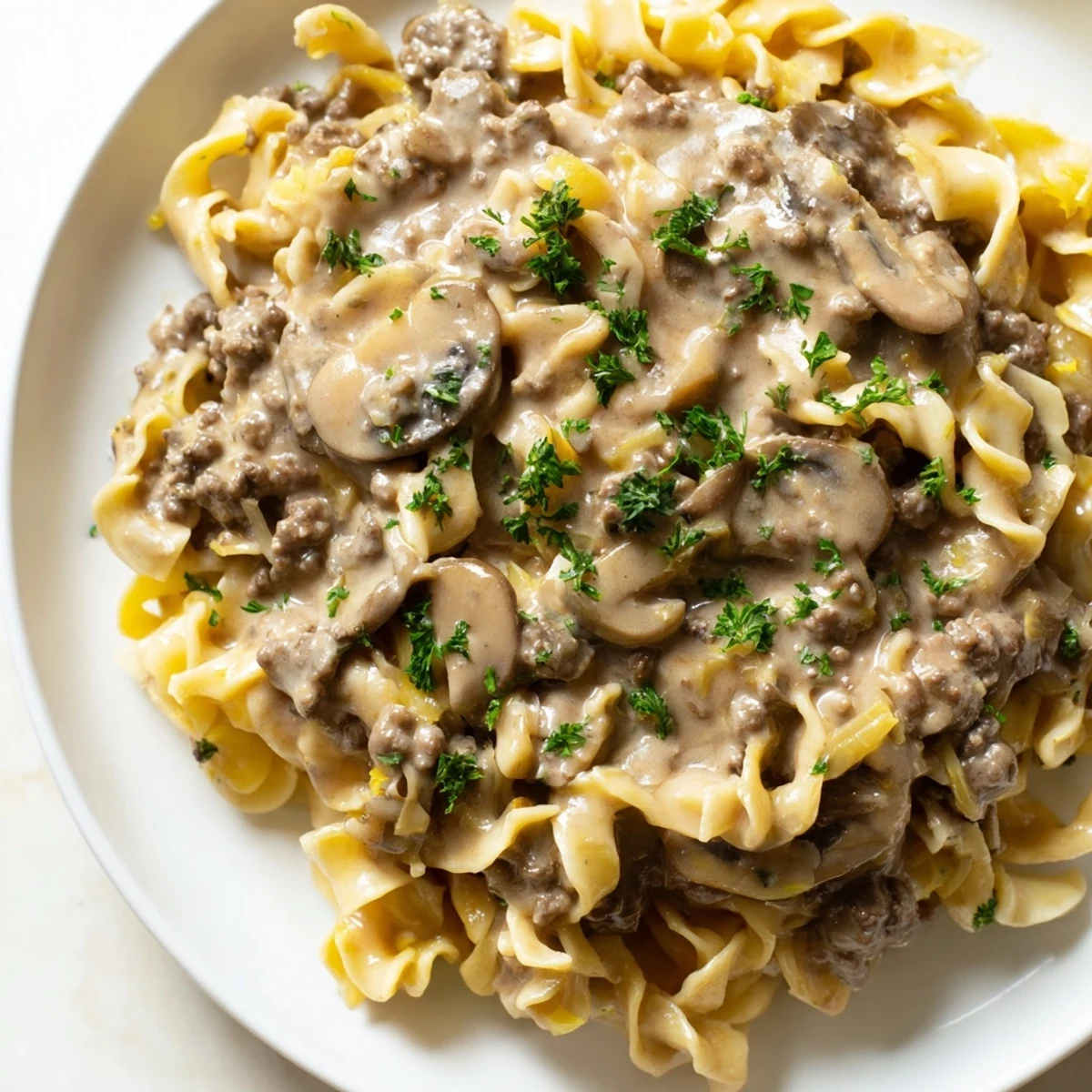 Hearty hamburger stroganoff with savory ground beef and mushrooms in a rich creamy sauce