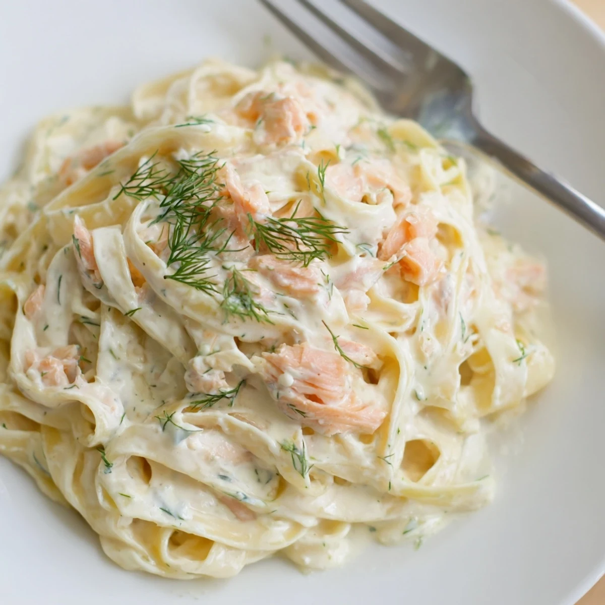 Silky hot smoked salmon pasta tossed in a rich white cream sauce  