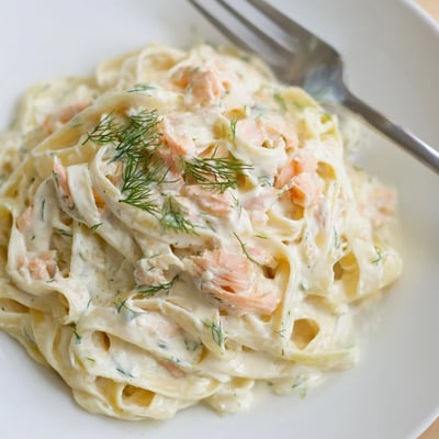 Silky hot smoked salmon pasta tossed in a rich white cream sauce  
